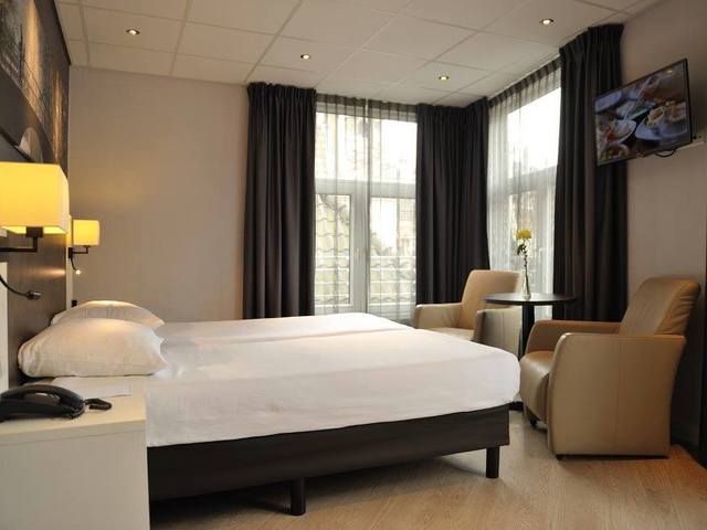 фото отеля Hotel Amsterdam De Roode Leeuw изображение №17