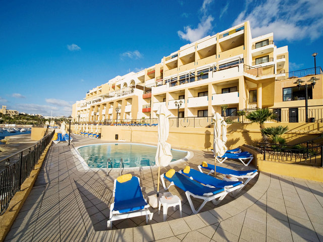 фото отеля Marina Hotel Corinthia Beach Resort изображение №1