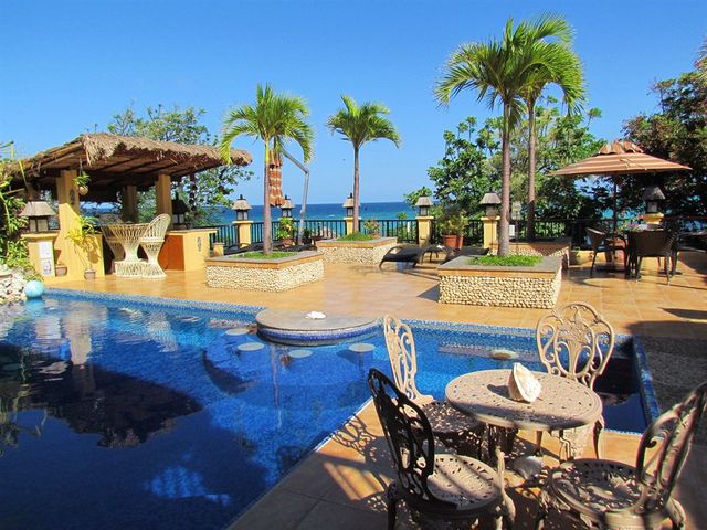 фото отеля Palm Breeze Villa изображение №33