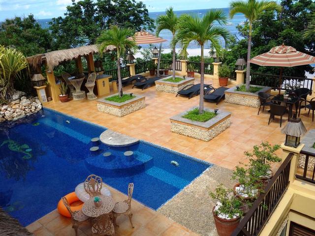 фото отеля Palm Breeze Villa изображение №17