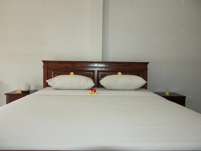 фотографии отеля Oka Kartini - Bed and Breakfast изображение №7