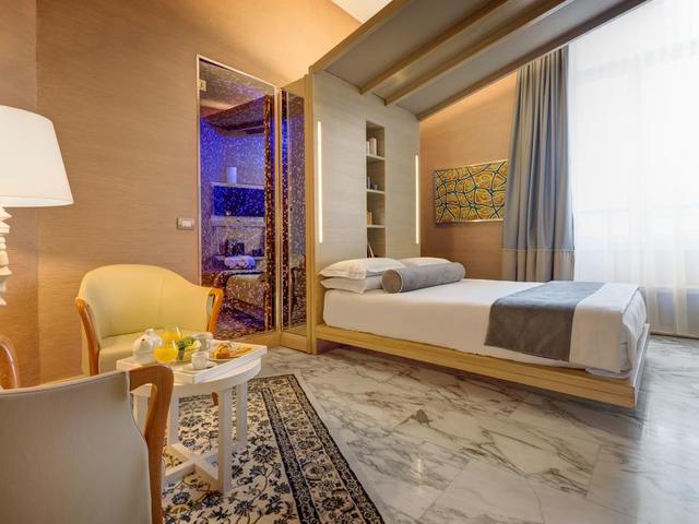 фото Dharma Hotel & Luxury Suites изображение №26