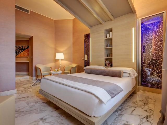 фотографии отеля Dharma Hotel & Luxury Suites изображение №3