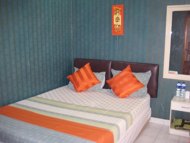фото отеля Orange Home's Syariah изображение №41