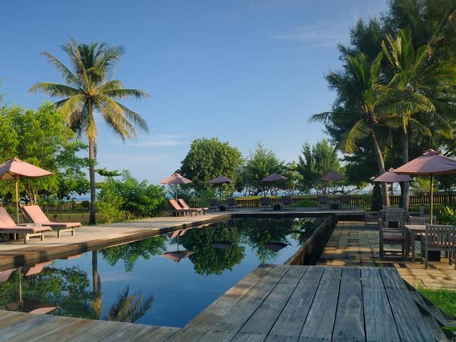 фото отеля Desa Dunia Beda Beach Resort изображение №1