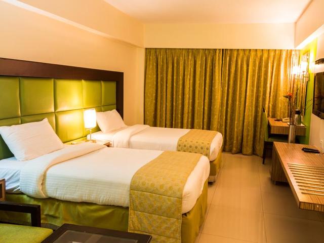 фото отеля OYO Premium Navi Mumbai Palm Beach Road изображение №9