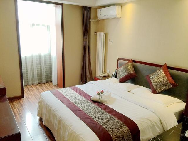 фотографии отеля Jialong Sunny Hotel изображение №35