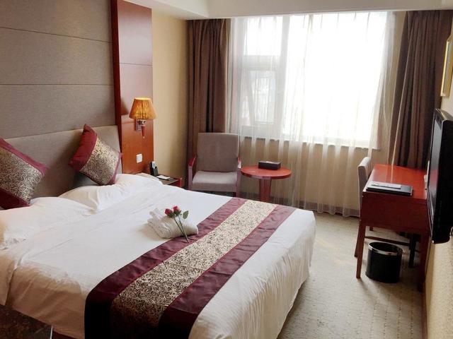 фотографии отеля Jialong Sunny Hotel изображение №3