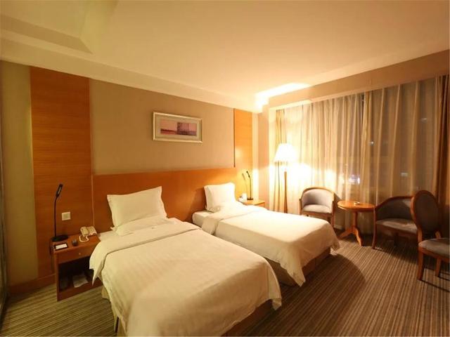 фотографии Dalian Bolt Hotel изображение №20