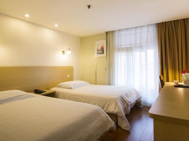 фото отеля Motel 168 Shanghai Sinan Road изображение №17