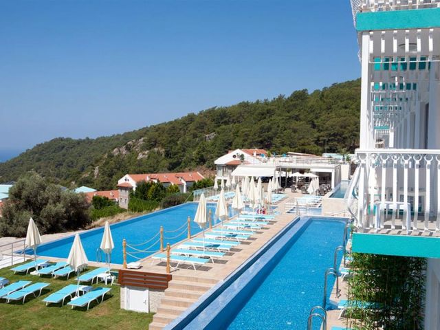 фото отеля Ramada by Wyndham Fethiye Oludeniz (ex. Sertil Deluxe Hotel & SPA) изображение №1