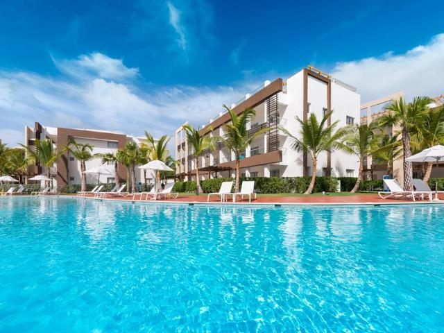 фото отеля Radisson Blu Resort&Residence (ex.BlueBay Grand Punta Cana; Blue Beach Punta Cana Luxury Resort) изображение №1