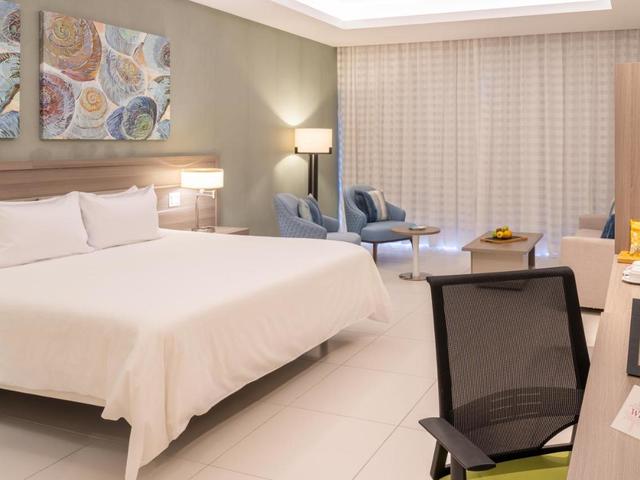 фото отеля Radisson Blu Resort&Residence (ex.BlueBay Grand Punta Cana; Blue Beach Punta Cana Luxury Resort) изображение №5