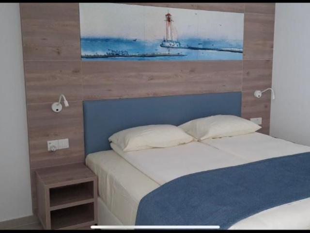 фотографии Karousos Beach Rooms изображение №20