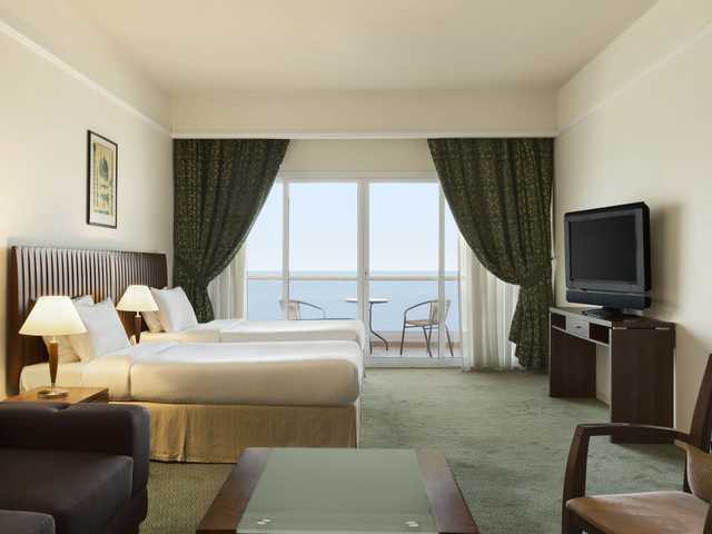 фото Ramada by Wyndham Beach Hotel Ajman (ex. Landmark Suites Ajman; Coral Suites) изображение №14