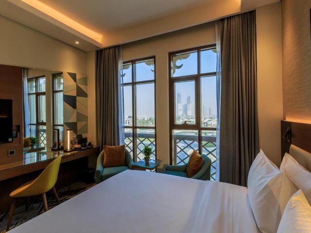 фотографии отеля S19 Hotel Al Jaddaf изображение №11