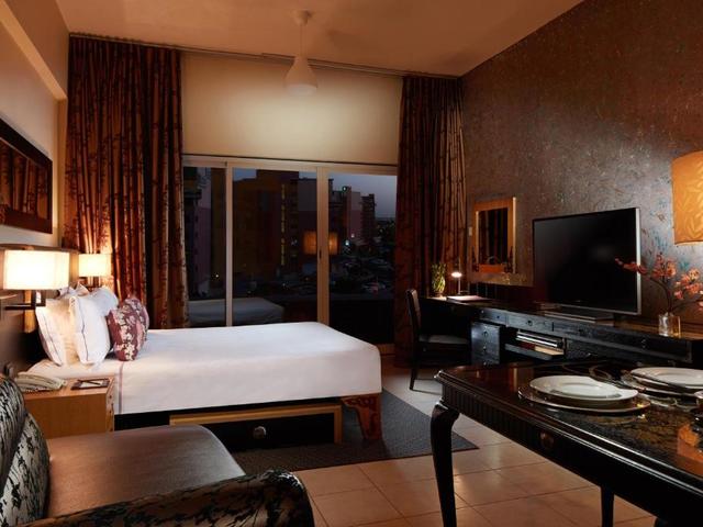 фото ZiQoo Hotel Apartment Dubai изображение №18