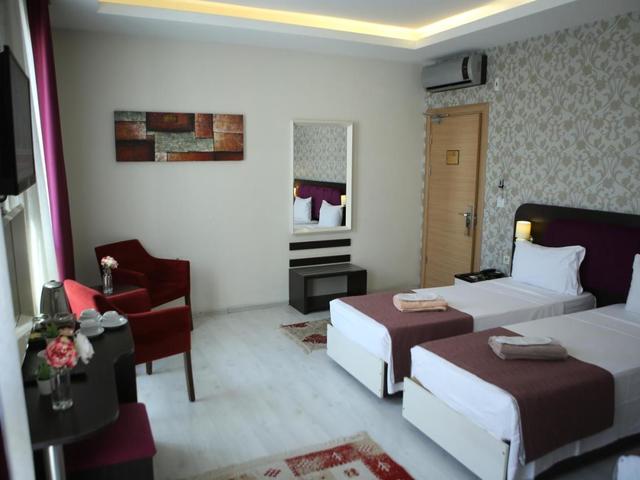 фото отеля Niconya Port Suites & Hotel изображение №29