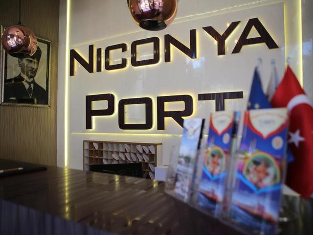 фотографии Niconya Port Suites & Hotel изображение №4