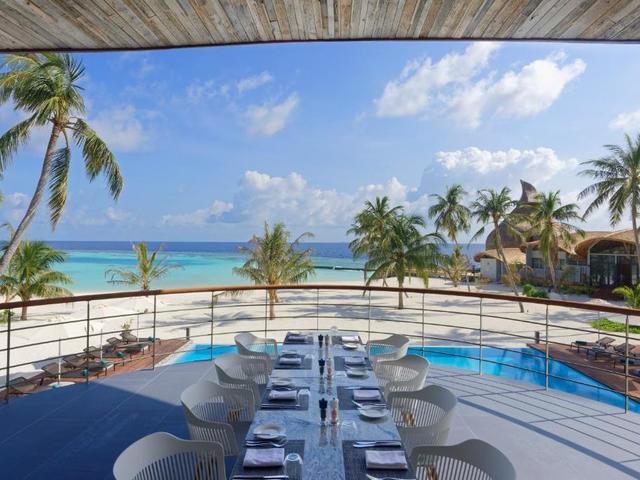 фотографии Outrigger Maldives Maafushivaru Resort изображение №28