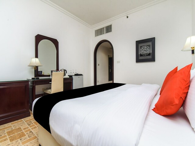 фото отеля Capital O 234 Tulip Inn Al Rahba изображение №17