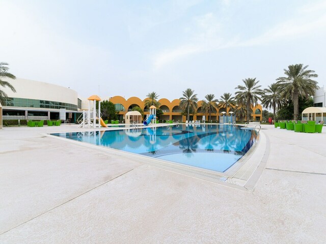 фото отеля Capital O 234 Tulip Inn Al Rahba изображение №1