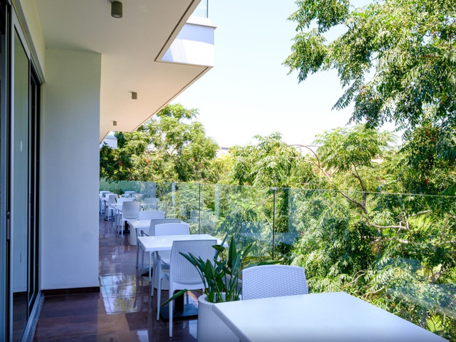 фото отеля Sanders Rio Gardens - Chic 1-bedroom Apartment By The Pool And With Balcony изображение №9