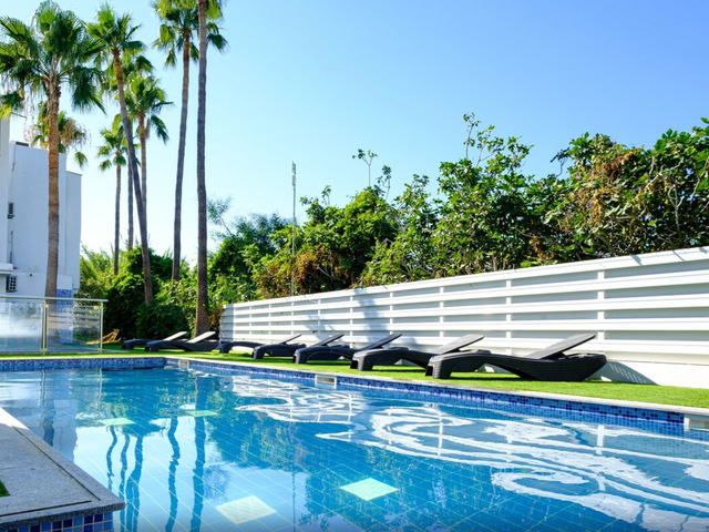 фотографии отеля Sanders Rio Gardens - Chic 1-bedroom Apartment By The Pool And With Balcony изображение №7