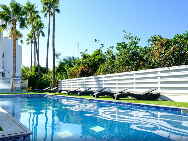 фотографии отеля Sanders Rio Gardens - Popular 1-bedroom Apartment With Shared Pool And Balcony изображение №3