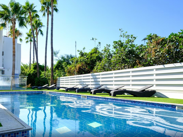 фотографии Sanders Rio Gardens - Smart 1-bedroom Apartment With Shared Pool And Balcony изображение №8