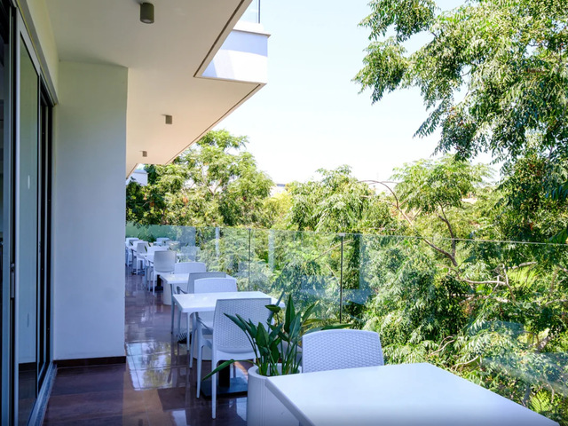 фотографии отеля Sanders Rio Gardens - Smart Studio With Shared Pool And Balcony изображение №7
