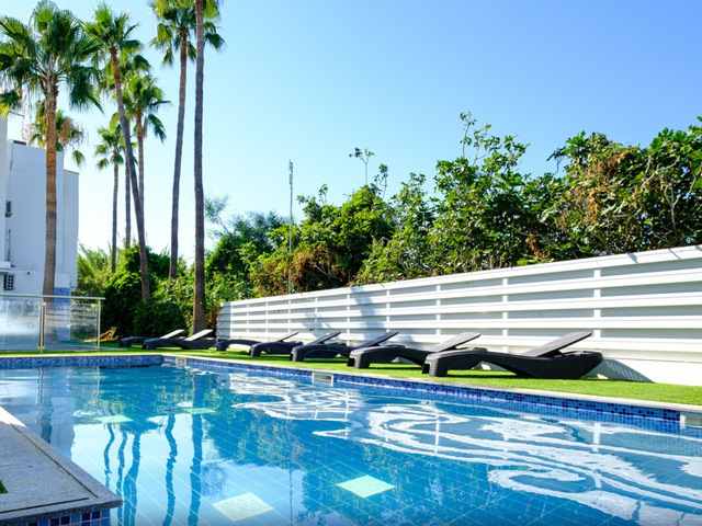 фото отеля Sanders Rio Gardens - Snug 1-bedroom Apartment With Shared Pool And Balcony изображение №13