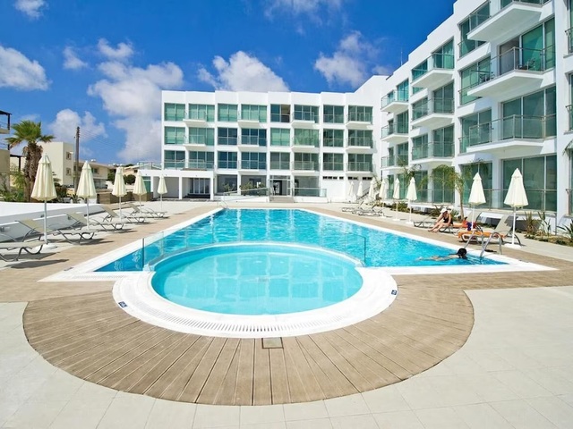 фото отеля Coralli Spa Beachfront Apartment With Breathtaking Sea Views изображение №1