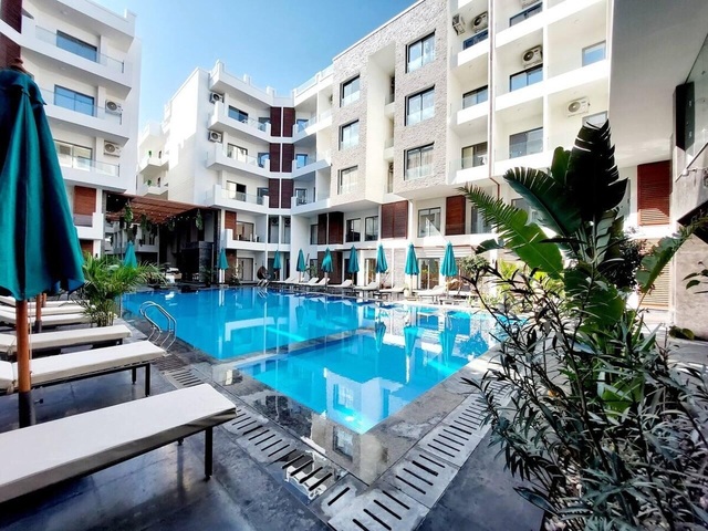 фото отеля Imperial Resort Hurghada - Bedroom With Pool View изображение №1