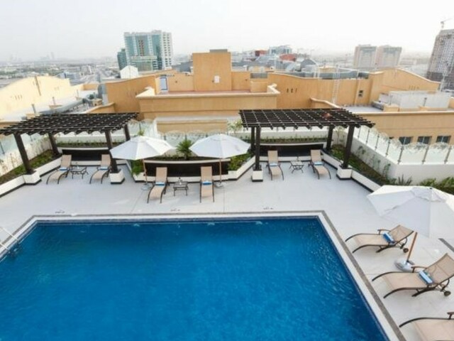 фото отеля Al Azmi Hotel Al Nahda изображение №1
