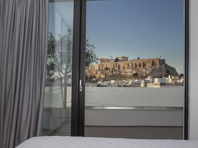 фотографии Luxury Penthouse Touching The Acropolis By GHH изображение №12