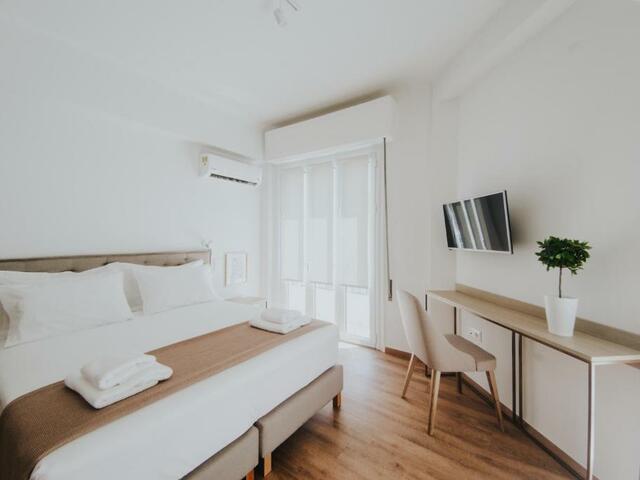 фотографии Voulis Attico Rooms & Apartments изображение №24
