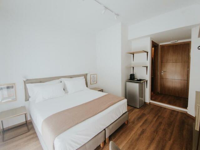 фотографии отеля Voulis Attico Rooms & Apartments изображение №11