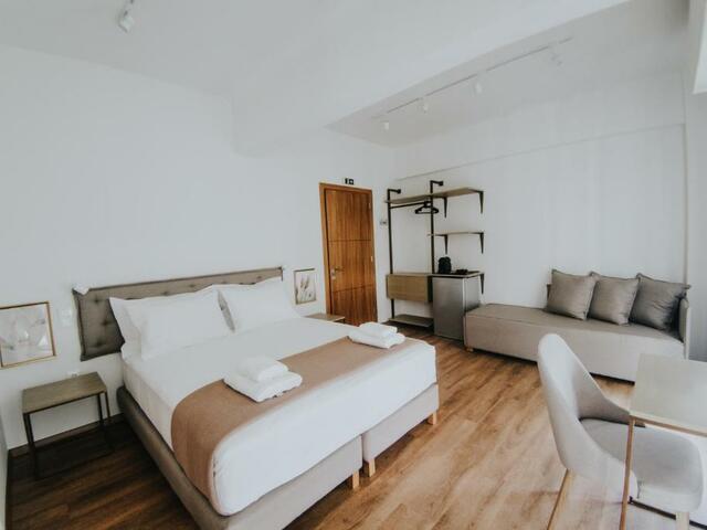 фотографии отеля Voulis Attico Rooms & Apartments изображение №7