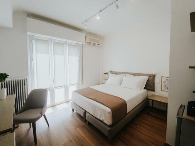фотографии Voulis Attico Rooms & Apartments изображение №8