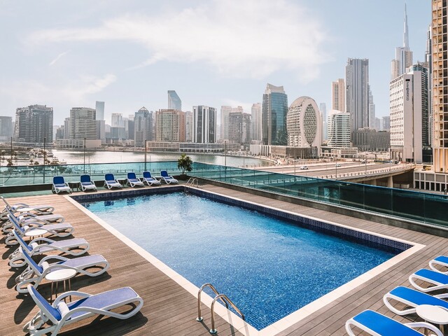 фото отеля Radisson Blu Dubai Canal View изображение №1