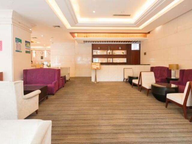 фото Hainan Wanlilong Business Hotel изображение №2