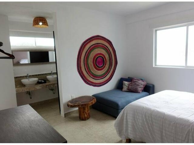 фото отеля Comfortable and colorful apartment Cancun изображение №1