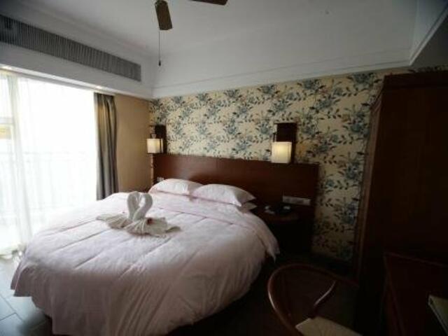 фото отеля Huangma Holiday Tiancheng Hotel изображение №13
