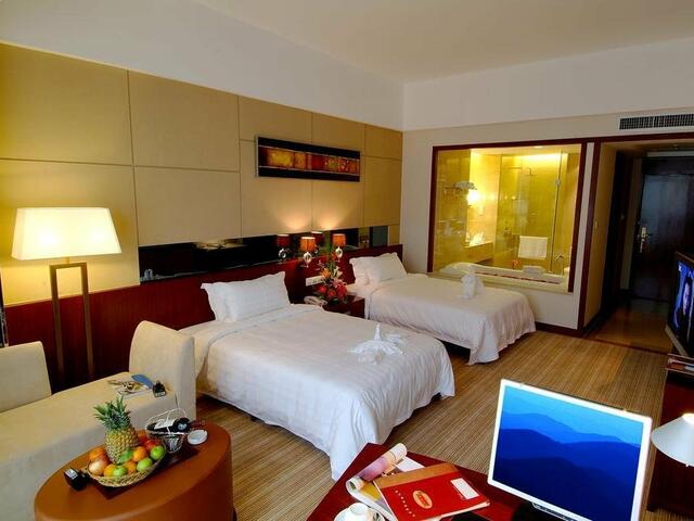 фотографии отеля Hainan Wanlilong Business Hotel изображение №11