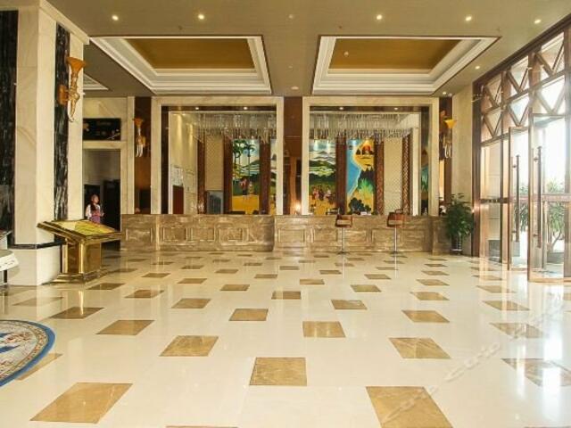 фотографии отеля Coconut Rhyme Golden Dragon Hotel (Qionghai Yinhai Road Flagship) изображение №3