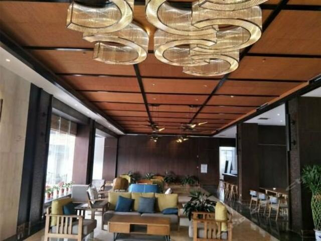 фото отеля Zhongzhou Jingxiu Holiday Hotel изображение №5