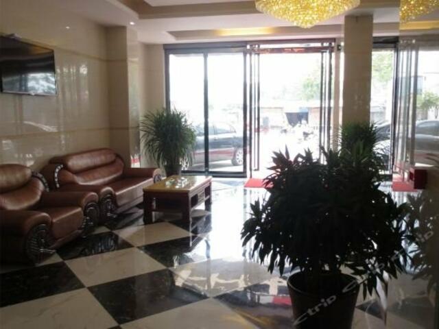 фото Wanning Minghuang Business Hotel изображение №10