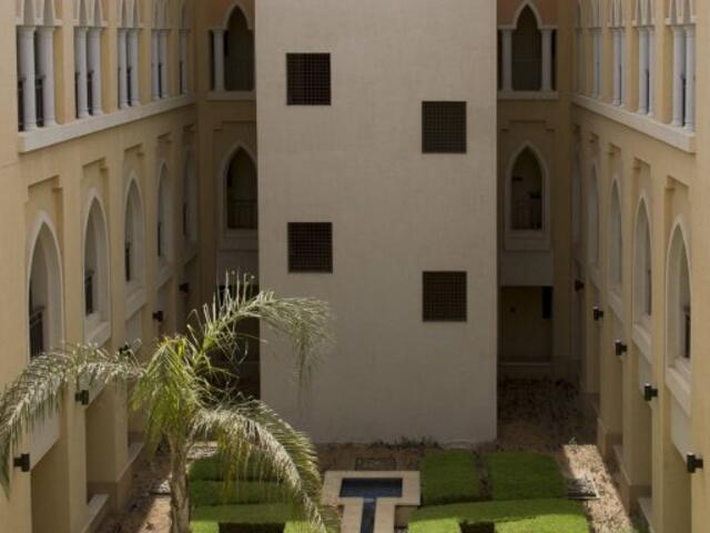 фотографии отеля Shangri-La Hotel Apartments Qaryat Al Beri изображение №3