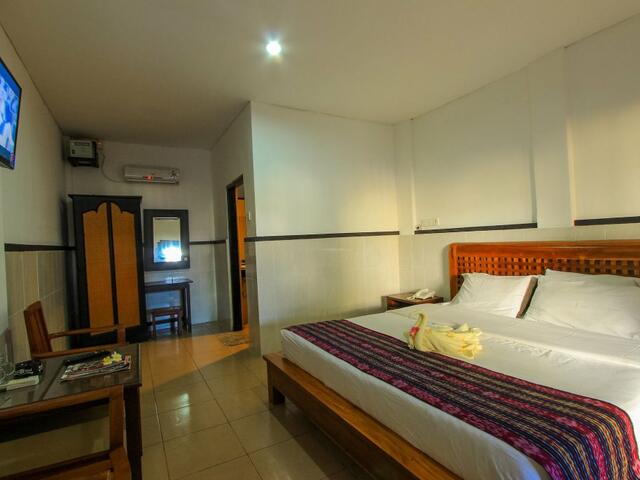 фото Taman Sari Beach Inn & Hostel изображение №26